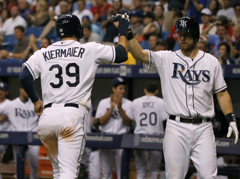  Kevin Kiermaier (39) is congratulated by second baseman Ben Zobrist during the seventh inning against the St. Louis Cardinals at Tropicana Field.  photo:  Kim Klement / USA TODAY Sports